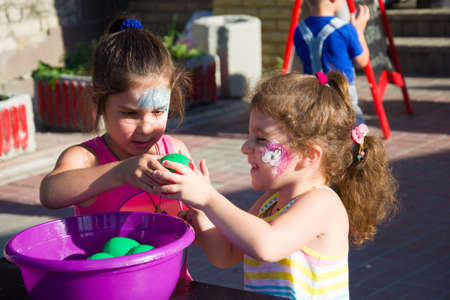 Alchevsk, Ukraine - July 27, 2017: Happy children play with animators in summer -のeditorial素材