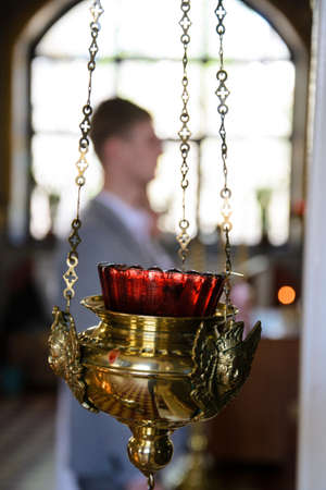 Alchevsk, Ukraine - April 28, 2017: Wedding ceremony of newlyweds in the Christian churchのeditorial素材