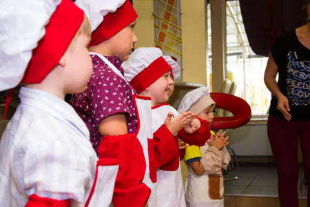 Alchevsk, Ukraine - July 23, 2017: School cook for children. Active games with children in the form of cooks.のeditorial素材