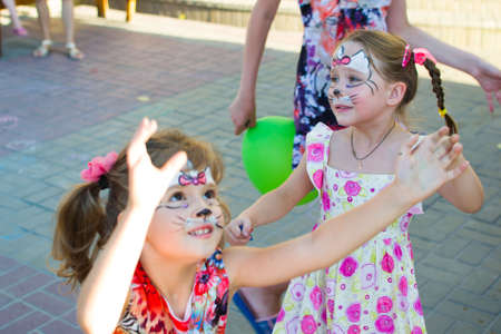 Alchevsk, Ukraine - August 3, 2017: Children's party- catch soap bubbles-のeditorial素材