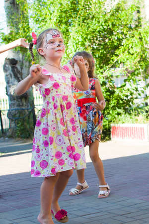 Alchevsk, Ukraine - August 3, 2017: Group of kids celebrating their friend's birthday party.のeditorial素材