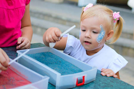 Alchevsk, Ukraine - August 17, 2017: Children's party- catch soap bubbles-のeditorial素材