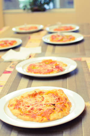 children cook pizza from raw ingredientsの写真素材