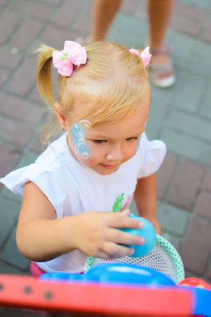 Alchevsk, Ukraine - August 17, 2017: Childrens party, catch soap bubblesのeditorial素材