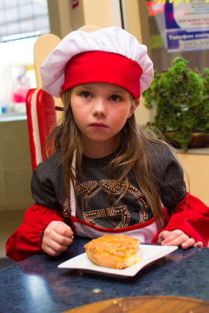 Alchevsk, Ukraine - September 24, 2017: school cooks for children in a cafeのeditorial素材