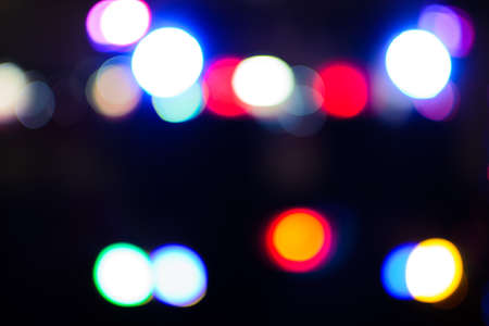 multicolored shiny and bokeh dark background, abstractの写真素材