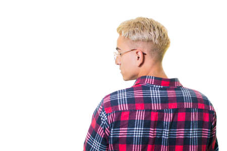 Cheerful guy in glasses posing in studio isolated on white backgroundの写真素材