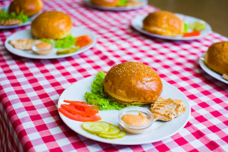 ingredients for making sandwiches with rolls on the table.の写真素材