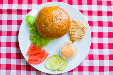 ingredients for making sandwiches with rolls on the table.の写真素材