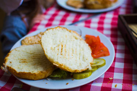 ingredients for making sandwiches with rolls on the table.の写真素材