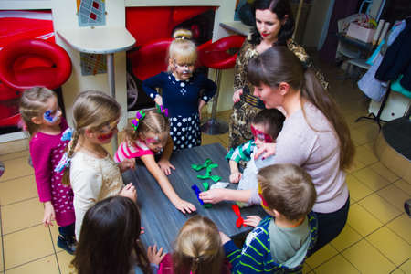 Alchevsk, Ukraine - November 10, 2018: children play with animatorsのeditorial素材