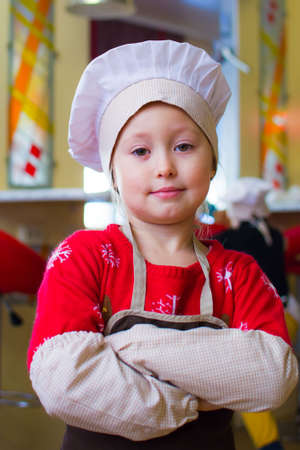 Alchevsk, Ukraine - November 21, 2018: children in the form of cooks posing.のeditorial素材