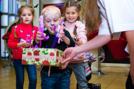 Alchevsk, Ukraine - October 27, 2018: children play with animators.のeditorial素材