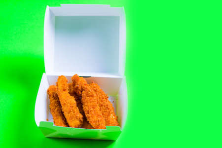 crusty cheese sticks fried in hot box lie in a box.の写真素材
