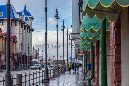TOMSK, RUSSIA - MARCH 17, 2019. The main street of the city of Tomsk with old buildingsのeditorial素材