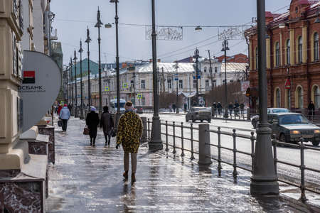 TOMSK, RUSSIA - MARCH 17, 2019. The main street of the city of Tomsk with old buildingsのeditorial素材