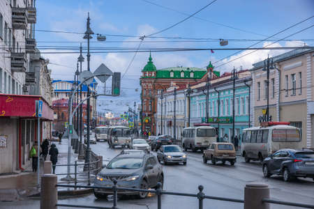 TOMSK, RUSSIA - MARCH 17, 2019. The main street of the city of Tomsk with old buildingsのeditorial素材