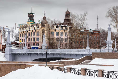 Tomsk/Russia - March 8, 2020. The embankment of the Ushayka river and the old bridge in the Governors district of Tomskのeditorial素材