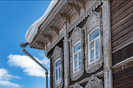 Tomsk, Russia - March 12, 2021. Wooden residential building on the street of the old district of Tomskのeditorial素材