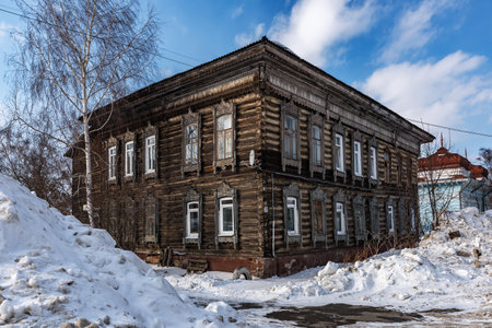 Tomsk, Russia - March 12, 2021. Wooden residential building on the street of the old district of Tomskのeditorial素材