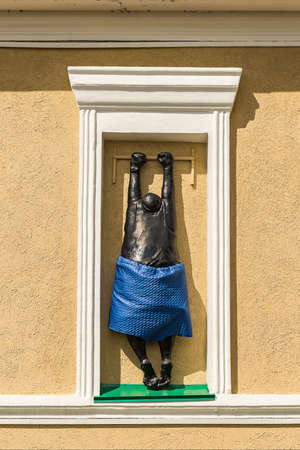 Tomsk Russia - May 20, 2021. Monument to a lover on the facade of the Museum of the History of the City of Tomskのeditorial素材