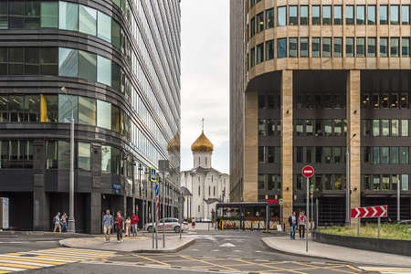 Moscow. Russia - August 8, 2021. Old Believers Temple in the name of St. Nicholas the Wonderworker is squeezed by modern buildingsのeditorial素材