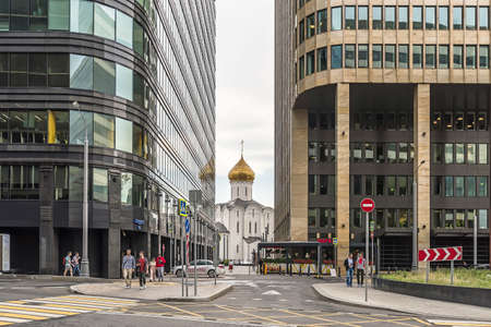 Moscow. Russia - August 8, 2021. Old Believers Temple in the name of St. Nicholas the Wonderworker is squeezed by modern buildingsのeditorial素材