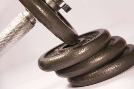 Dumbbell parts on a homogeneous backgroundの写真素材