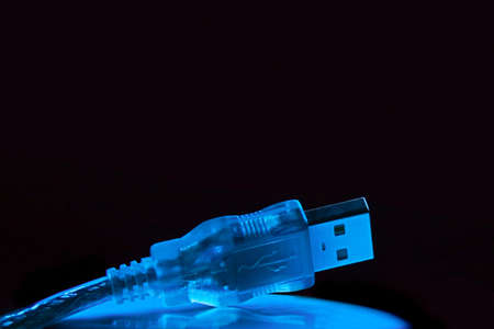 This colour not computer effect. It is dark blue illumination of a subject.の写真素材