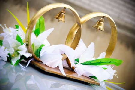wedding rings on a carの写真素材
