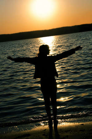 girl on a sunset background の写真素材