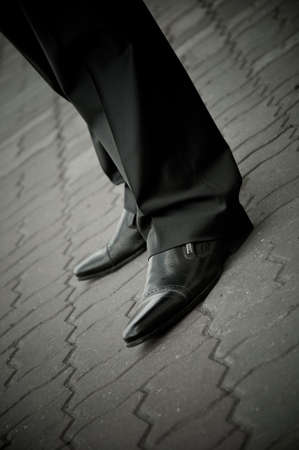 standing imposing man in a patent leather shoes  legs only  businessman classical Well-dressed clothing の写真素材