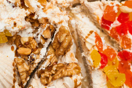 part of sweet cake with a walnut, cream and fruit  Holiday symbolの写真素材