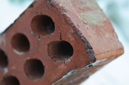 old deformed cracked red brick   industrial object backgroundの写真素材