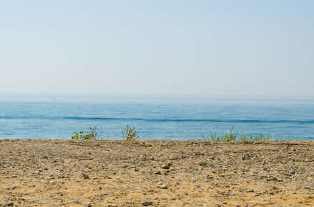 silence seashore  Blue haze horizon view  Water blur backgroundの写真素材