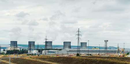 many industrial cooling tower for atomic power station. air pollutionの写真素材