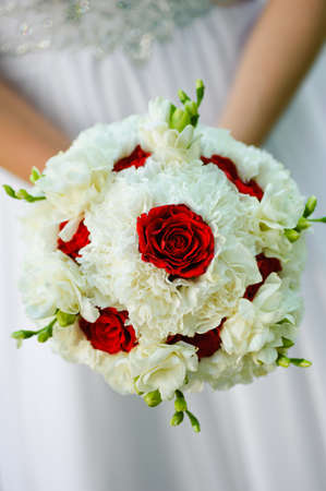 beauty wedding bouquet of red roses and white flowersの写真素材