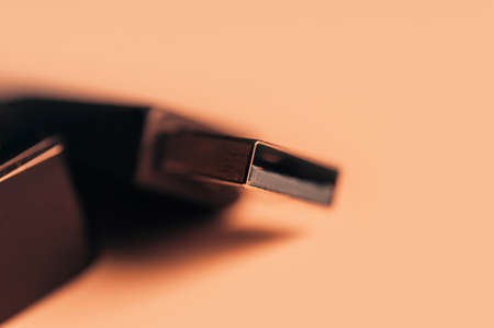 Part of cable USB with selective focus. Sepia toned.の写真素材