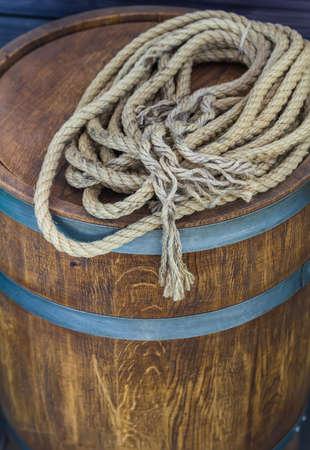 long twisted rope lying on brown tunの写真素材