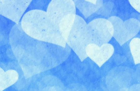 dreamy light soft hearts from snow on blue backgroundの写真素材