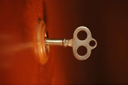 old secret key photo. Natural warm light from yellow lampの写真素材