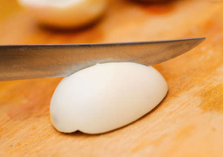 cutting egg with soft selective focusの写真素材