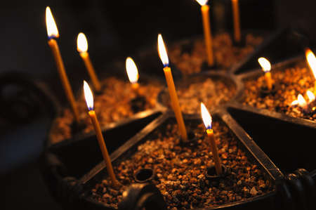 Burning candle in orthodox church. Selective focus techniqueの写真素材