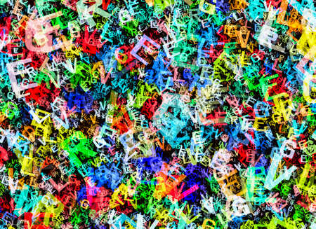 heap of abstract multicolored alphabet letters backgroundの写真素材