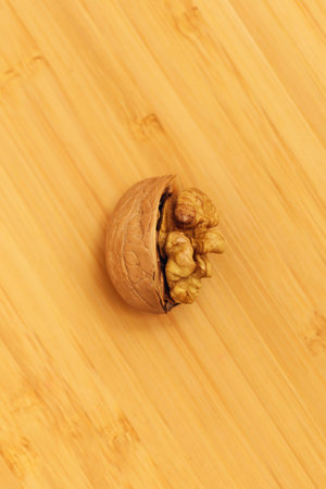 a half-opened walnut lies on the table. Top viewの写真素材