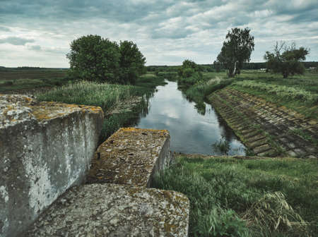 Water flowing in a channel with nature background. . Beautiful landscapes. Beauty in the nature