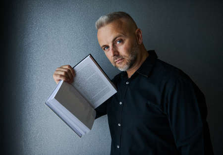 Portrait of impressive imposing handsome stylish middle aged Caucasian man, successful businessman,...