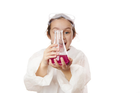 Detail: smart little girl hands holding a flat-bottomed flask with purple liquid, while doing chemical experiments in chemistry class, isolated on white background with copy space for advertising textの写真素材