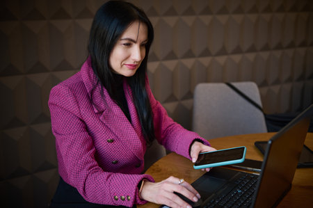 Successful confident 40-45 years old middle-aged Caucasian woman, entrepreneur in casual wear,...