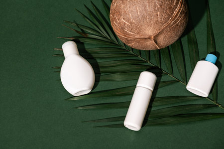 Top view of white small bottles of cosmetic products with natural organic ecological ingredients and...